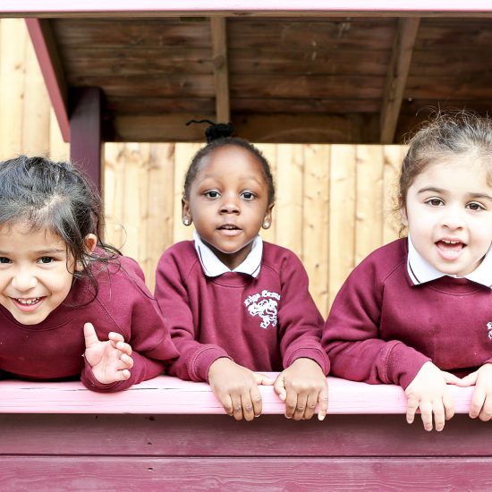 children in a wooden playhouse