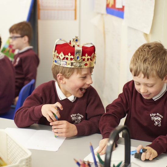 boy in a crown laughing